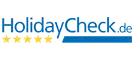 HolidayCheck.de Logo mit 5 goldenen Sternen, Symbol für eine ausgezeichnete Bewertung von Bauernhofurlauben in Südtirol.